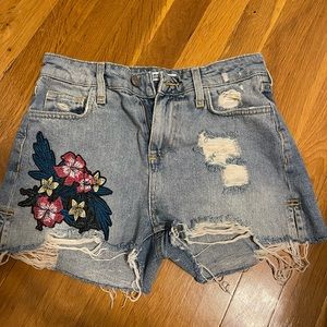 Light wash Zara Jean shorts with flower patches